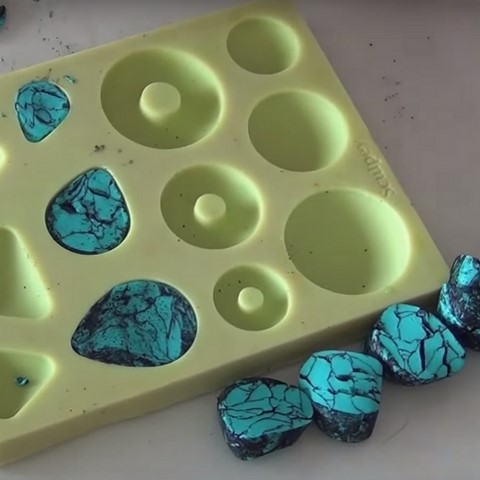 Fimo paste molded to make turquoise fakes